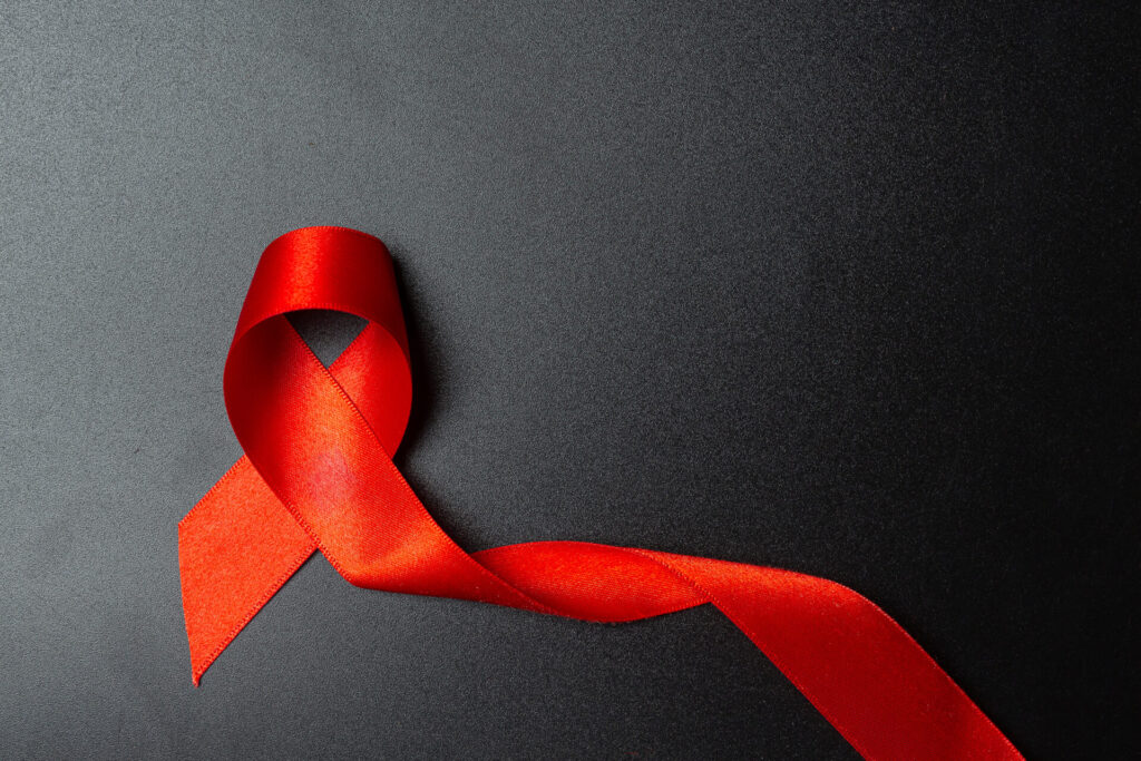 Red Ribbon HIV Awareness Concept World AIDS Day and World Sexual